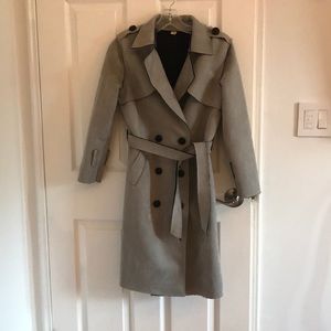 Grey trench coat made by suede kind of material.